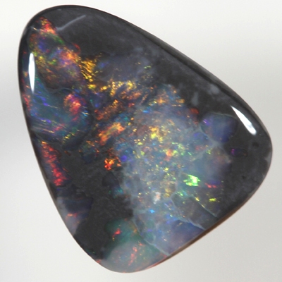 SOLID BLACK OPAL Sparkling bright fire bordered by black opal